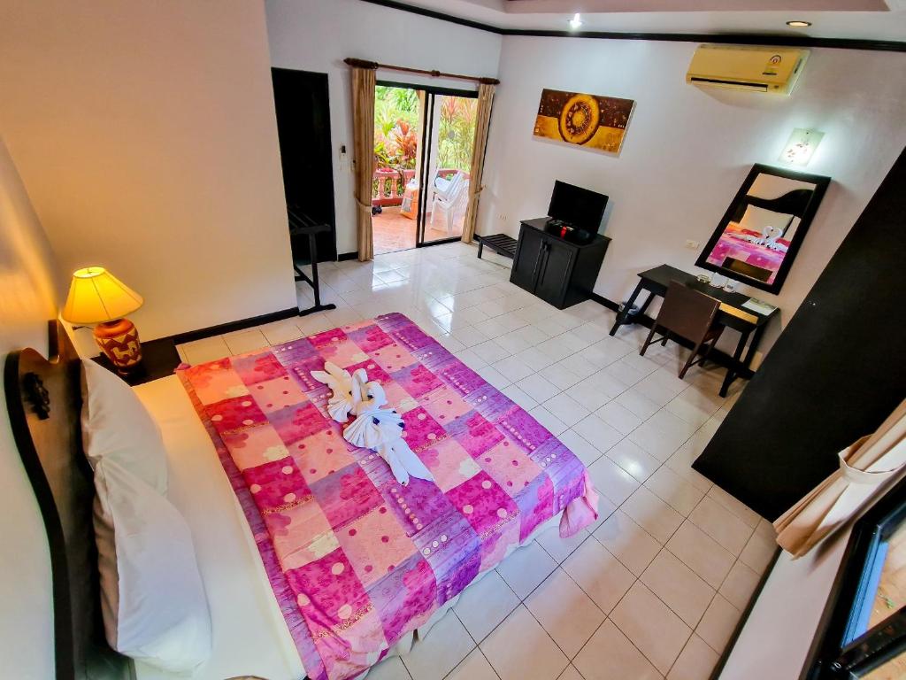 Postel nebo postele na pokoji v ubytování Jasmin Resort - SHA Plus