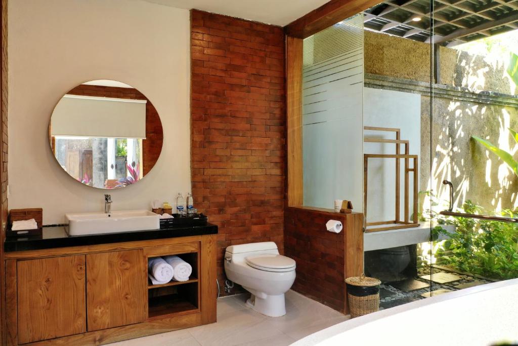 Koupelna v ubytování Sagara Villas and Suites Sanur by AHM