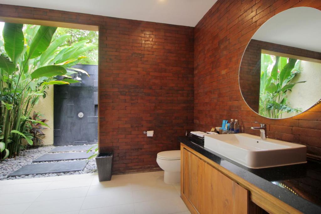 Koupelna v ubytování Sagara Villas and Suites Sanur by AHM