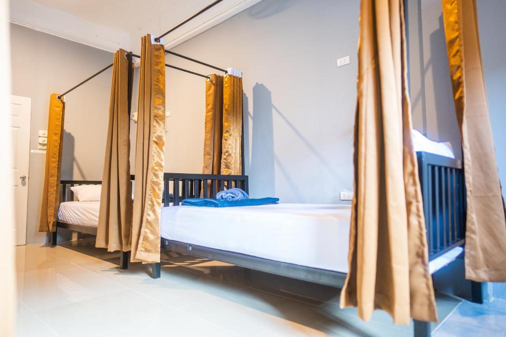 Postel nebo postele na pokoji v ubytování K-Bunk AoNang Center