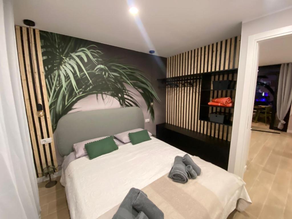A bed or beds in a room at The Little Jewel with Ocean View - Las Americas