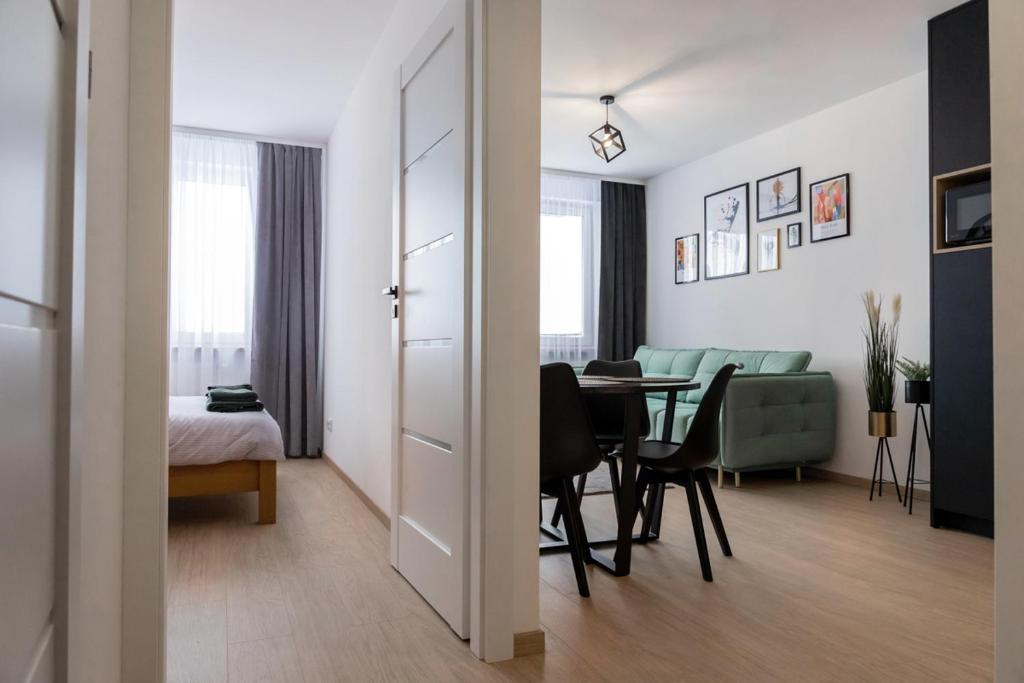 Postel nebo postele na pokoji v ubytování Apartament przy PILECKIEGO 33
