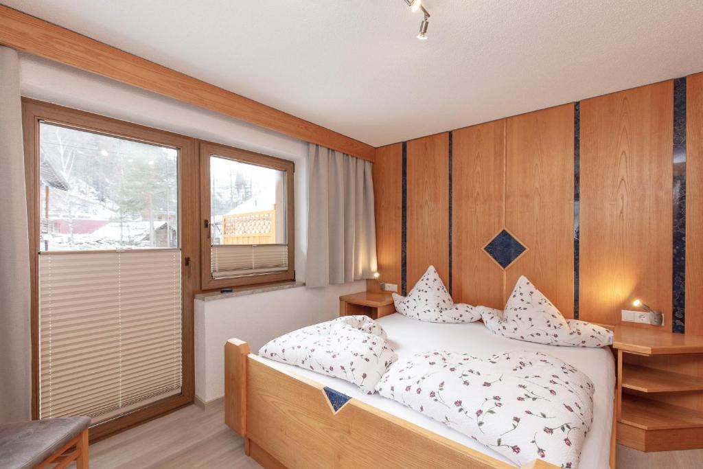 Postel nebo postele na pokoji v ubytování Appartement Rosengarten