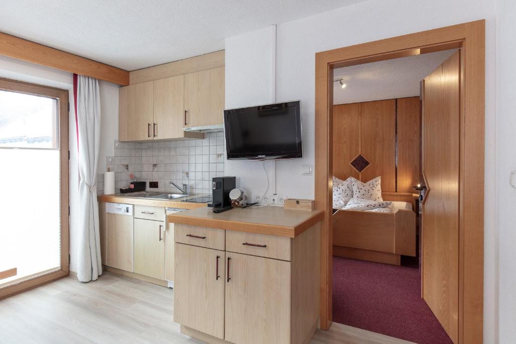Kuchyň nebo kuchyňský kout v ubytování Appartement Rosengarten