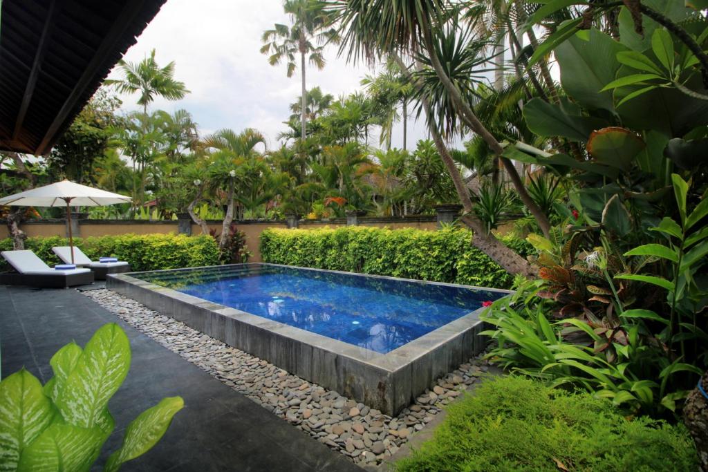 Bazén v ubytování Sagara Villas and Suites Sanur by AHM nebo v jeho okolí
