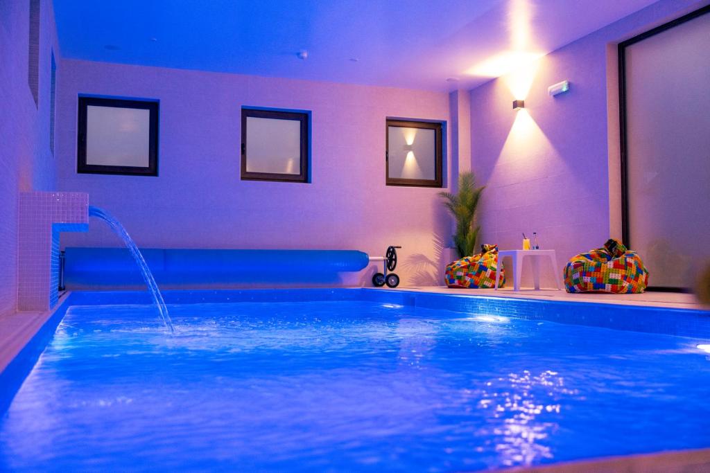 Bazén v ubytování Hotel Aura Unirii nebo v jeho okolí