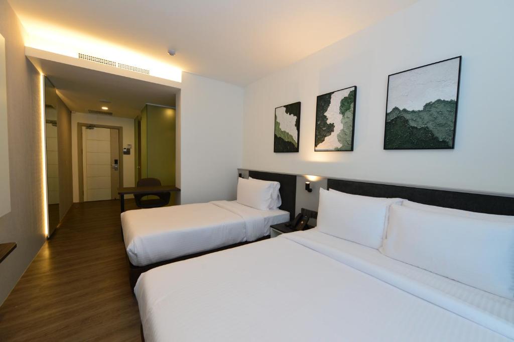 Postel nebo postele na pokoji v ubytování Rume Hotel
