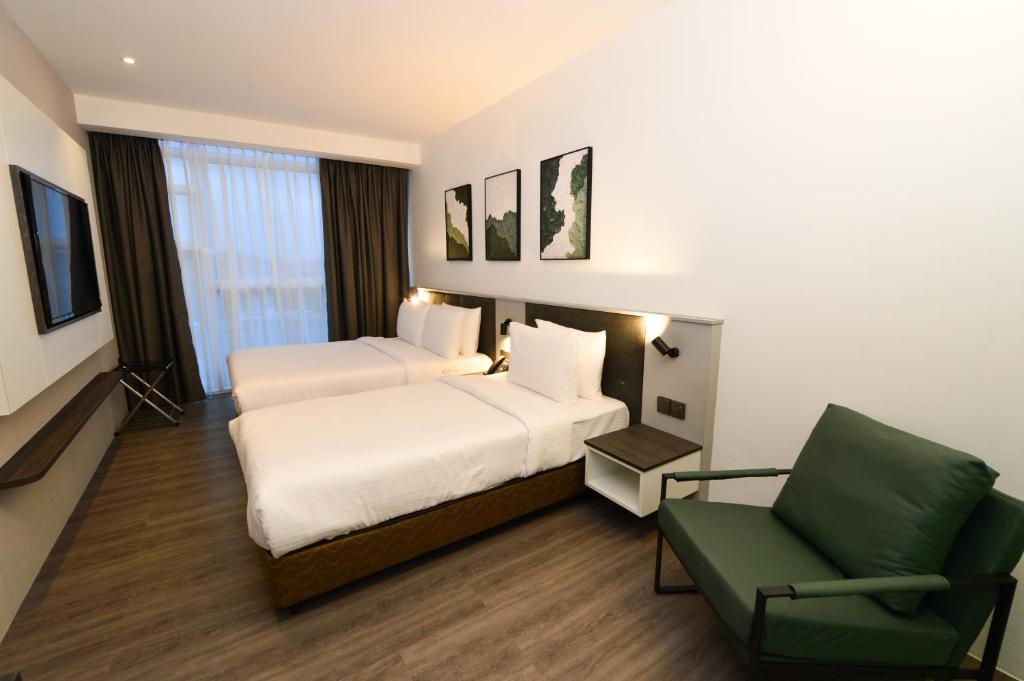 Postel nebo postele na pokoji v ubytování Rume Hotel