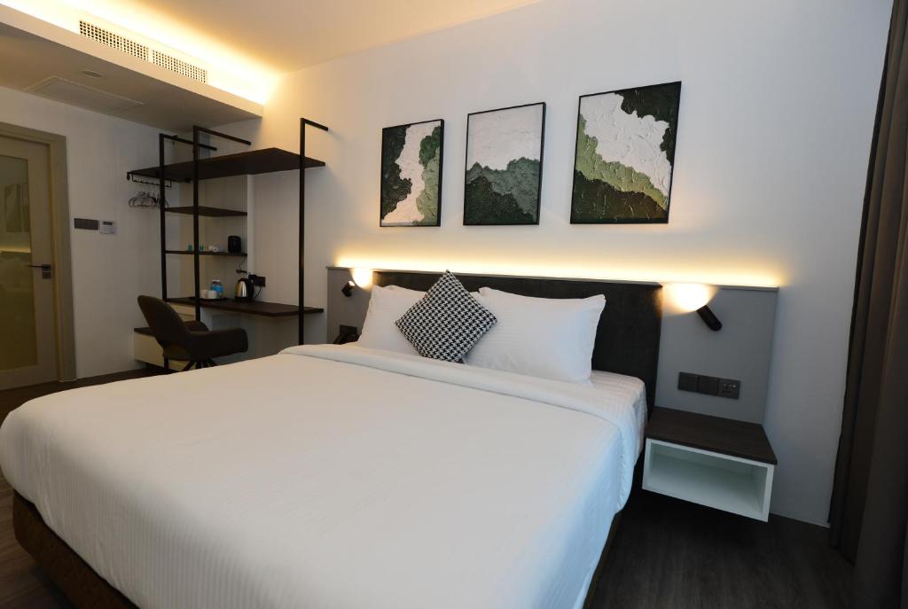 Postel nebo postele na pokoji v ubytování Rume Hotel