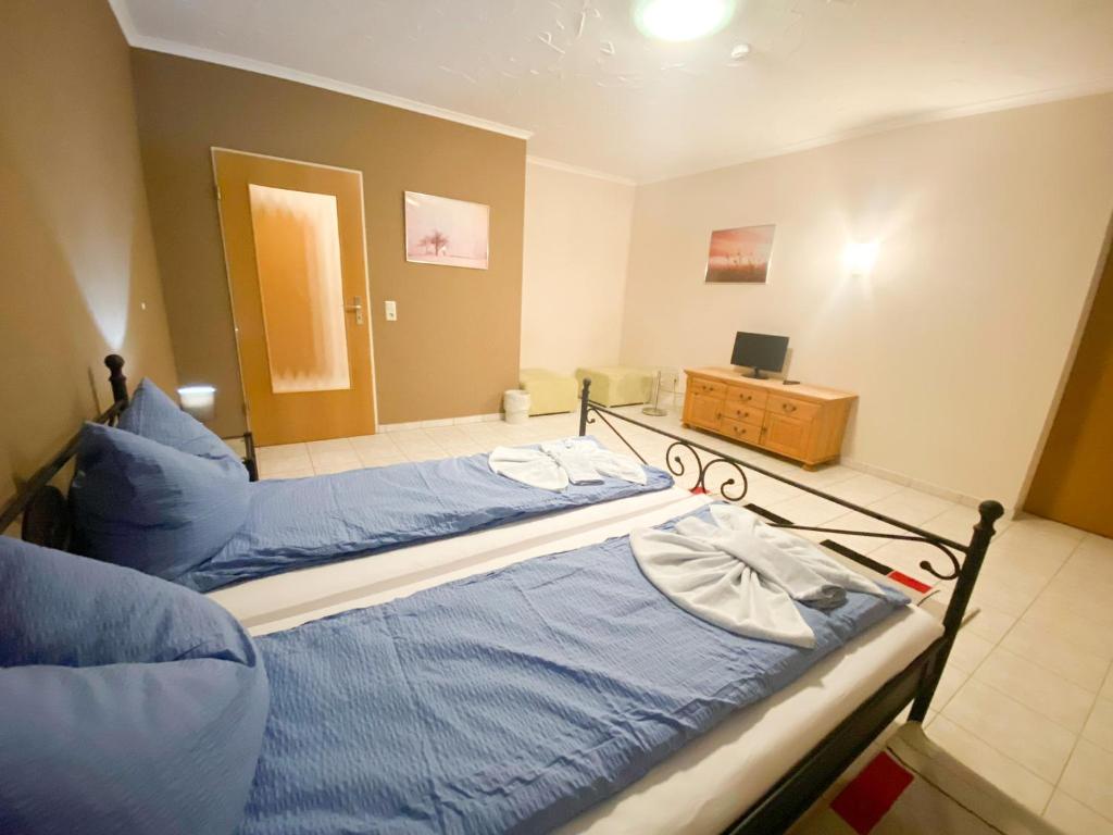 Postel nebo postele na pokoji v ubytování Hotel Zur Linde