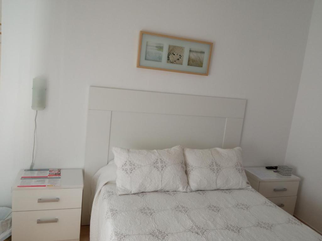Cama o camas de una habitación en Apartamento compartido con la Anfitriona