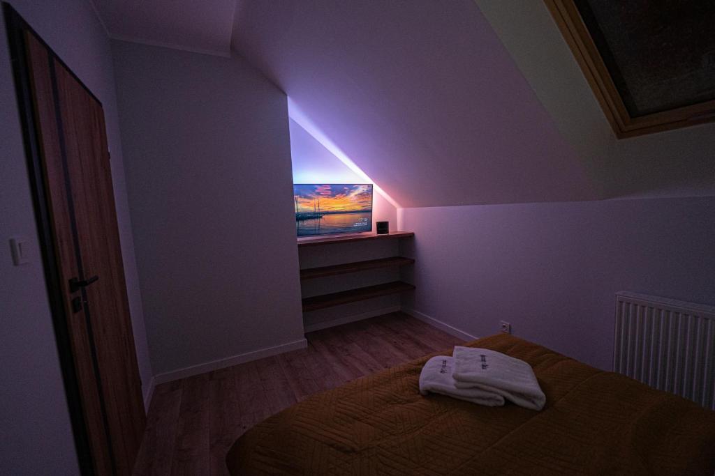 Posteľ alebo postele v izbe v ubytovaní Apartament w Cieplicach Panorama