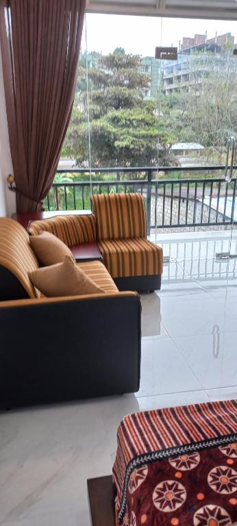 Posezení v ubytování Ella Odyssey Inn