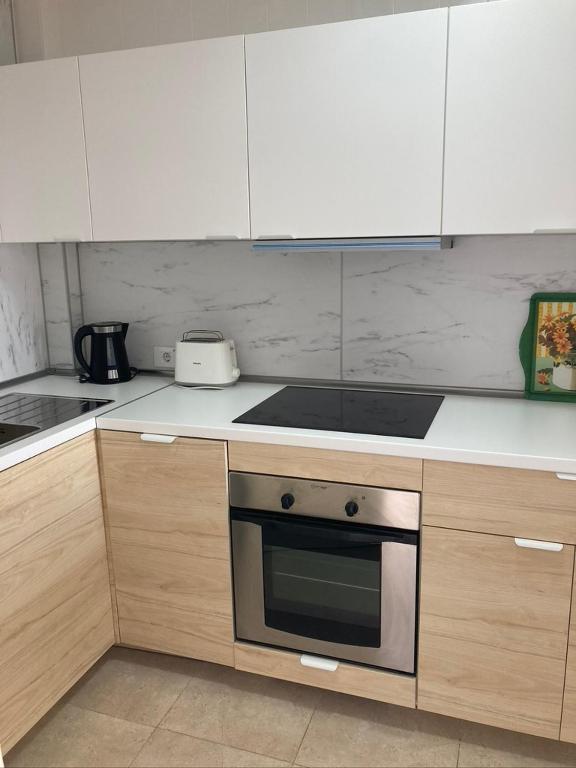 Kuchyň nebo kuchyňský kout v ubytování Apartamento Marina
