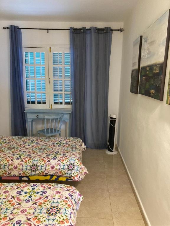 Postel nebo postele na pokoji v ubytování Apartamento Marina