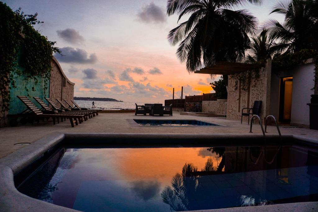 Bazén v ubytování Hotel Caribbean Cartagena nebo v jeho okolí