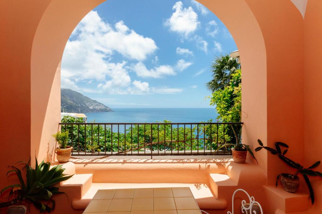 a view of the ocean from a balcony at Villa Principe Giovanni in Positano