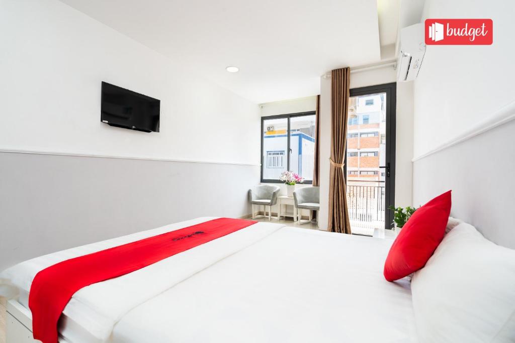 Postel nebo postele na pokoji v ubytování Khanh Linh Hotel
