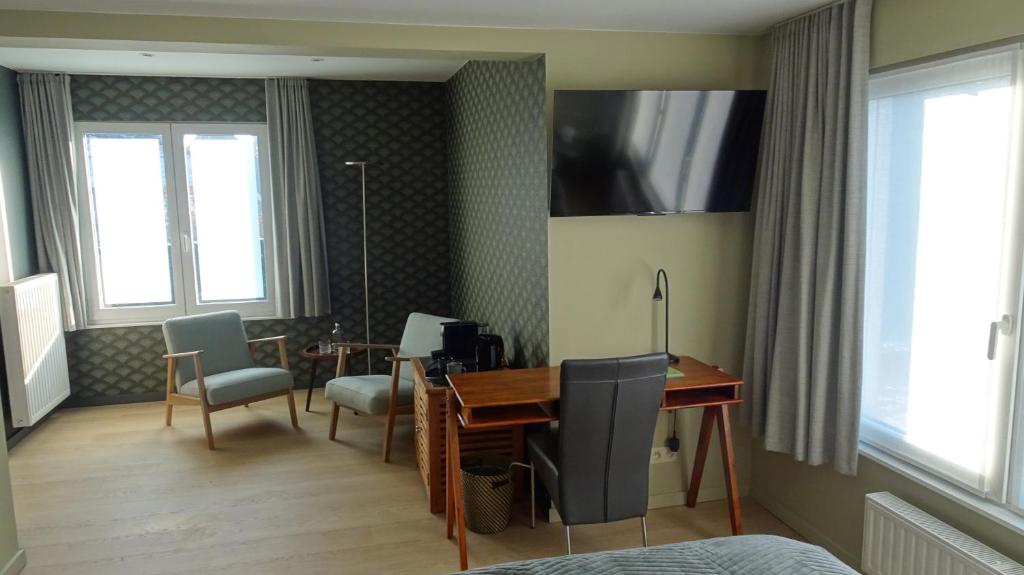 TV a/nebo společenská místnost v ubytování B&B Maaltebrug
