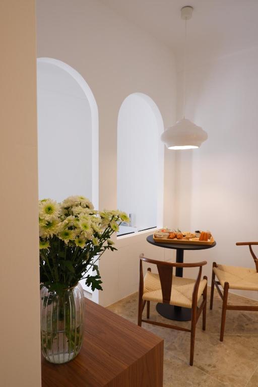 Posezení v ubytování PALAZZO CAMERLENGO Suites Relax
