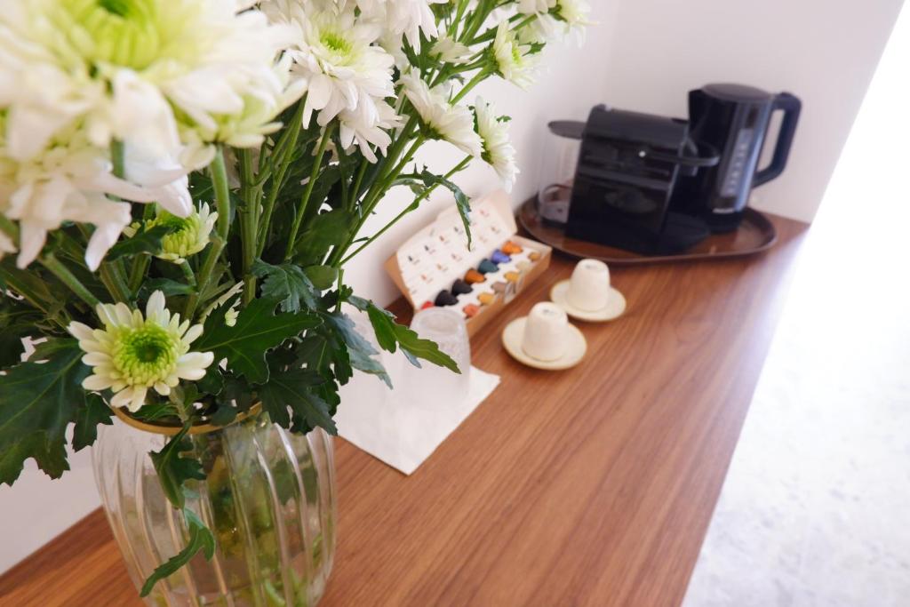 Příslušenství pro přípravu čaje a kávy v ubytování PALAZZO CAMERLENGO Suites Relax