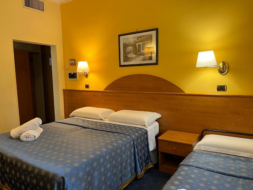 Postel nebo postele na pokoji v ubytování Baltik Guesthouse