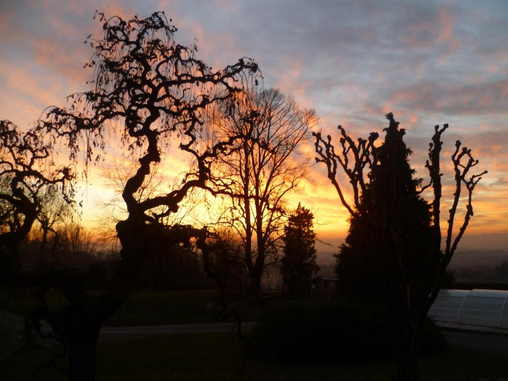 The sunrise or sunset as seen from a panziókat or nearby