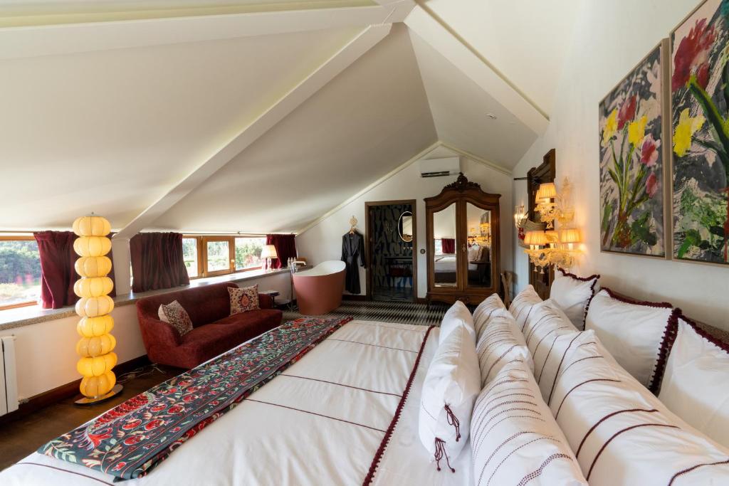 Postel nebo postele na pokoji v ubytování Casa Beatnik Hotel