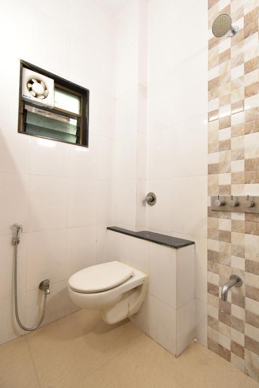 Koupelna v ubytování Hotel Sai Sparsh