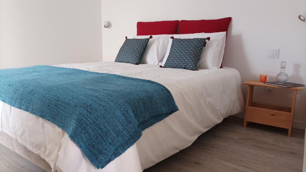 Postel nebo postele na pokoji v ubytování SulSeixe Guesthouse