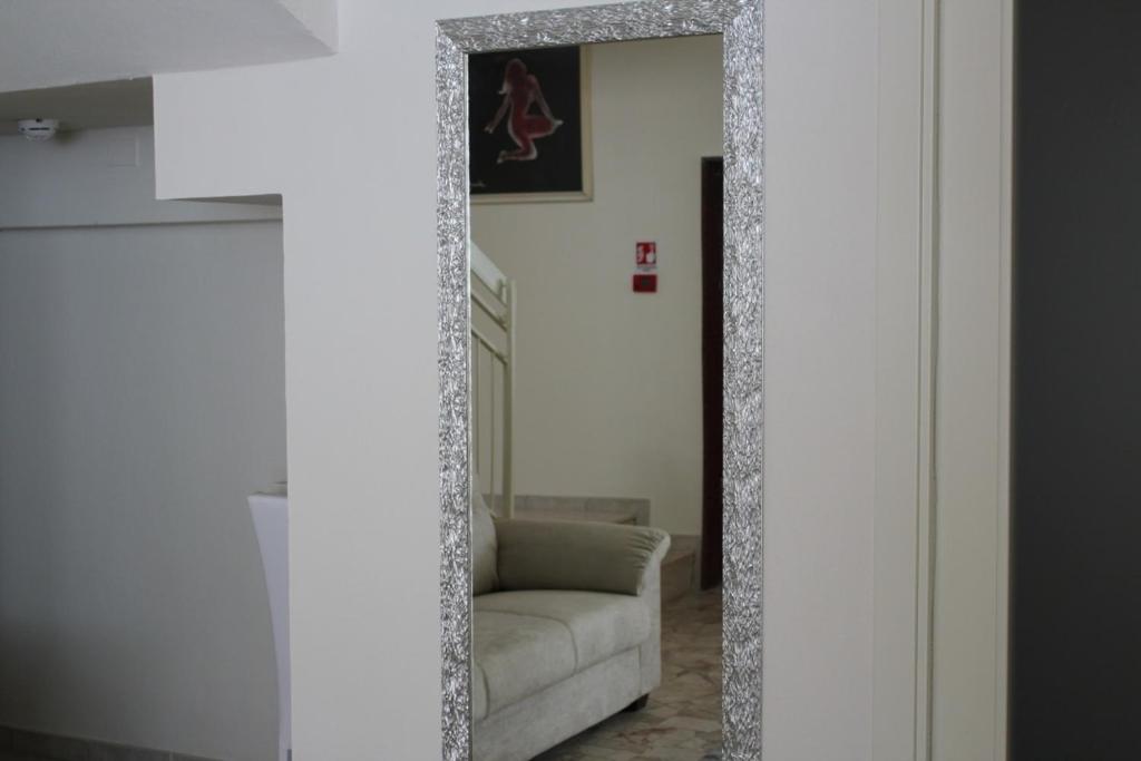 Postel nebo postele na pokoji v ubytování Hotel Marina