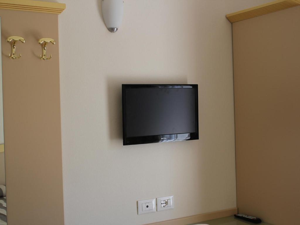 TV a/nebo společenská místnost v ubytování Hotel Marina