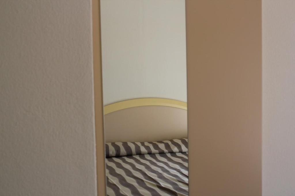 Postel nebo postele na pokoji v ubytování Hotel Marina