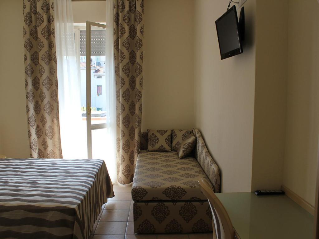 Postel nebo postele na pokoji v ubytování Hotel Marina