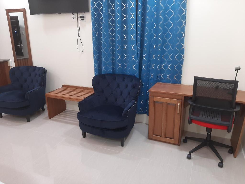 TV a/nebo společenská místnost v ubytování PESHERES INN & SPA