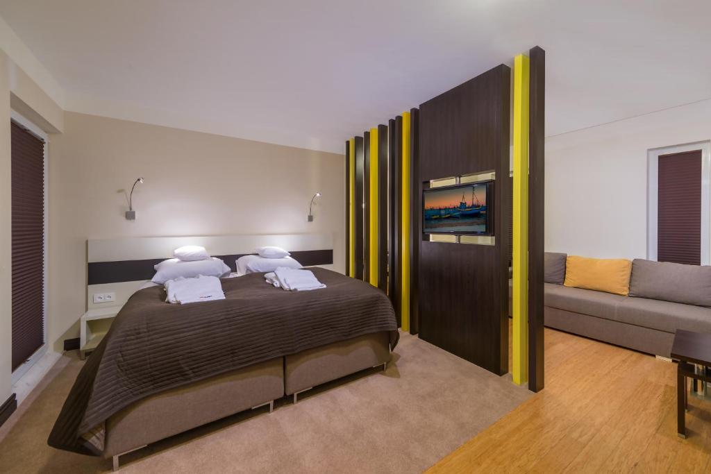 Posteľ alebo postele v izbe v ubytovaní Villa Buki Pokoje & SPA