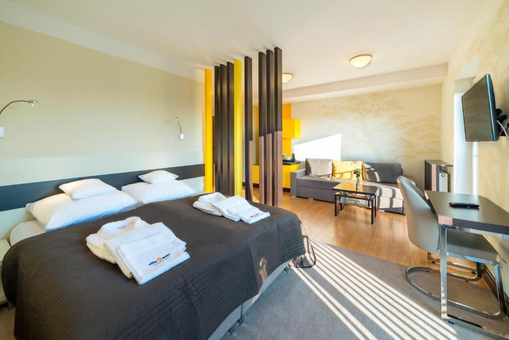 Posteľ alebo postele v izbe v ubytovaní Villa Buki Pokoje & SPA