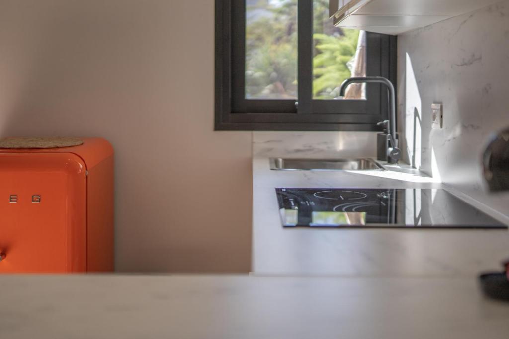 A kitchen or kitchenette at The Little Jewel with Ocean View - Las Americas