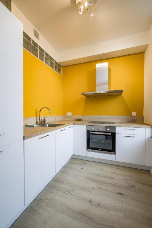 Kuchyň nebo kuchyňský kout v ubytování Gîtes in Huy - Appartements chaleureux dans le centre de Huy