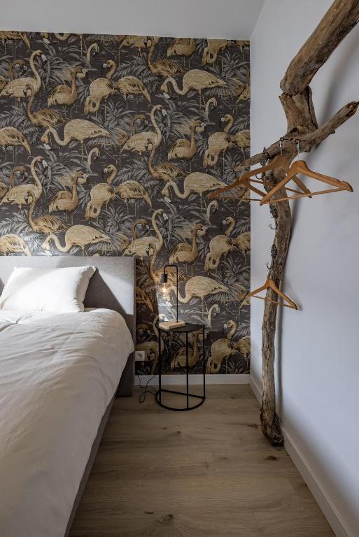 Postel nebo postele na pokoji v ubytování Gîtes in Huy - Appartements chaleureux dans le centre de Huy
