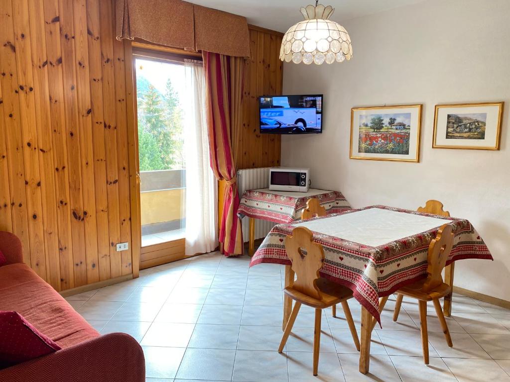 A television and/or entertainment centre at Residence Sci Sport