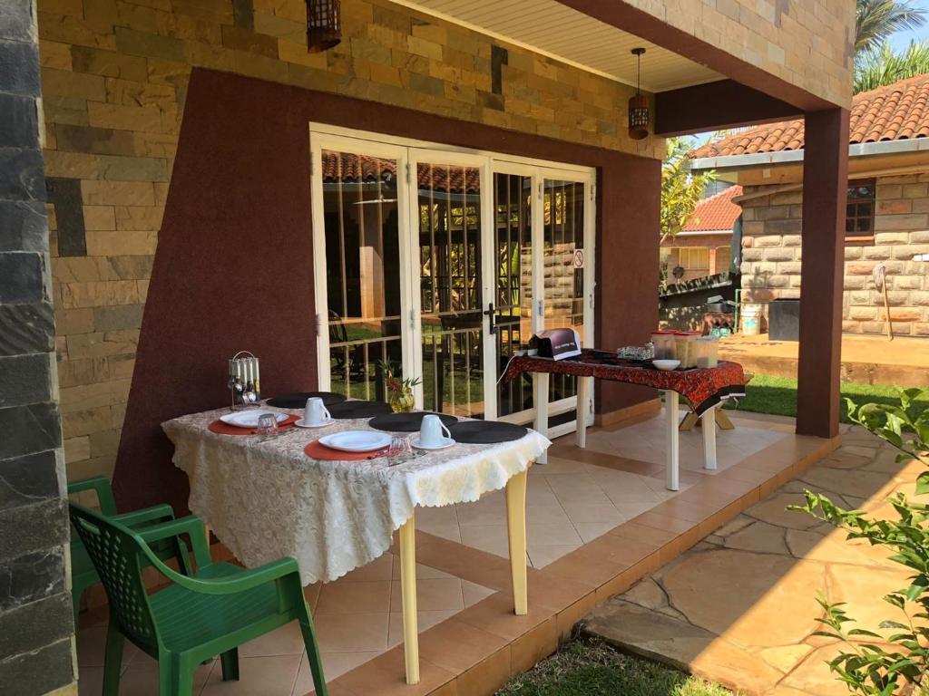 Patio nebo venkovní prostory v ubytování Edaala Comfort - Cottage Rooms