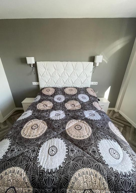 Postel nebo postele na pokoji v ubytování Piso playa Maktub