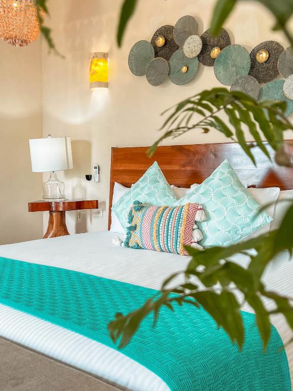 Postel nebo postele na pokoji v ubytování Le Muuch Hotel Boutique