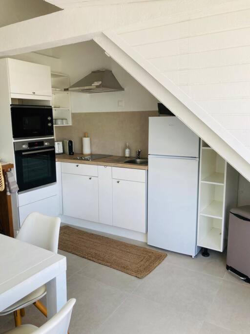 Kuchyň nebo kuchyňský kout v ubytování Love Spot Appartement