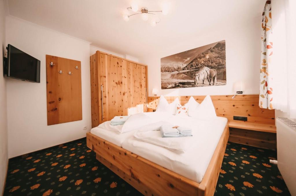 Postel nebo postele na pokoji v ubytování Posers Bergwelt B&B