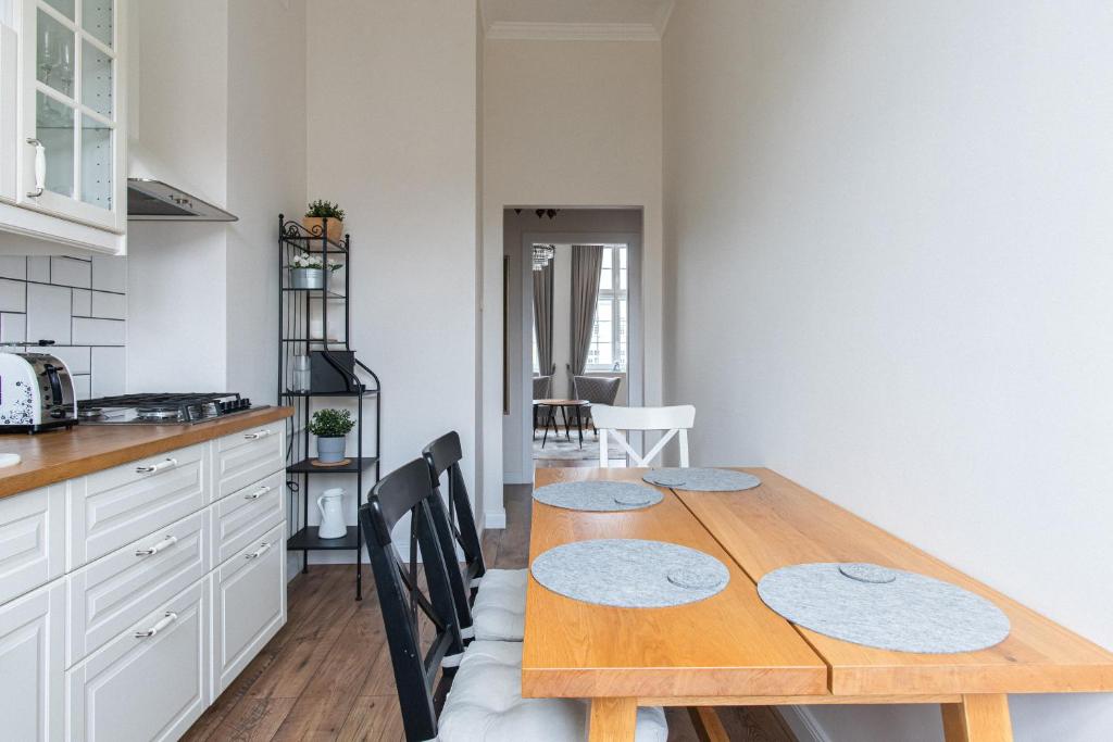 Kuchyňa alebo kuchynka v ubytovaní Olives Marina Apartment Gdańsk