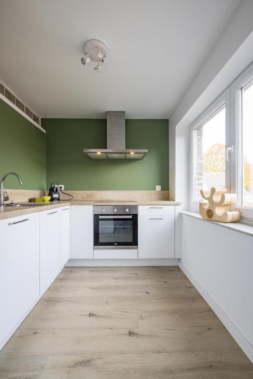 Kuchyň nebo kuchyňský kout v ubytování Gîtes in Huy - Appartements chaleureux dans le centre de Huy