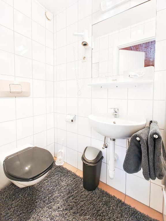 Koupelna v ubytování Partenerhof