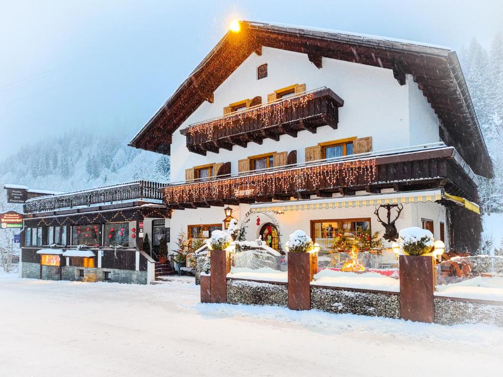 a building in the snow in front at Partenerhof in Partenen